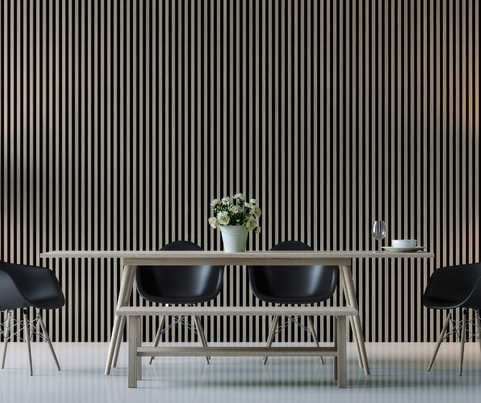 panel wall with desk and four black chairs