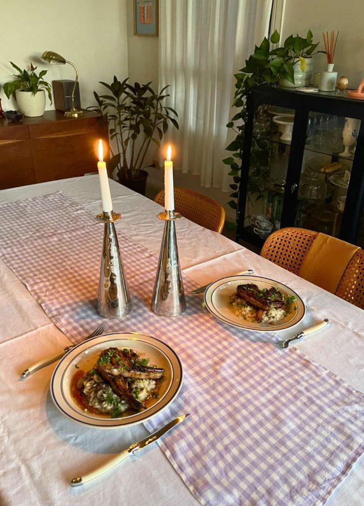 Table with candles and meal